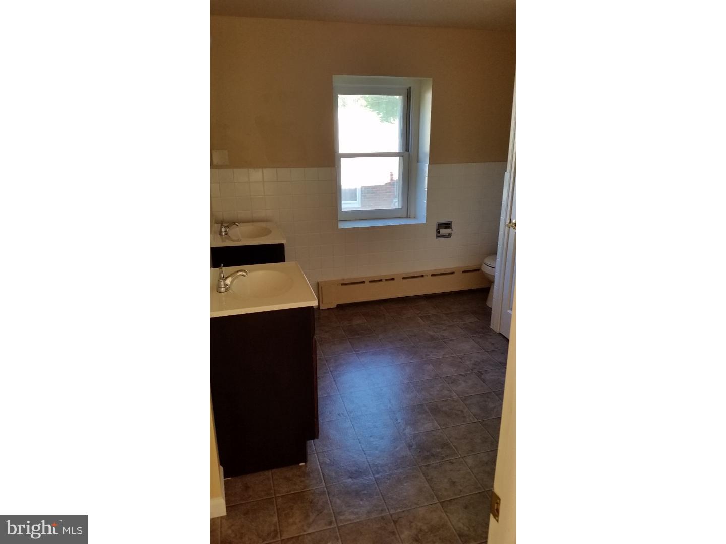 309 Reed Street Mohnton, PA 19540 - Photo 19 of 25 a room with a window and cabinets