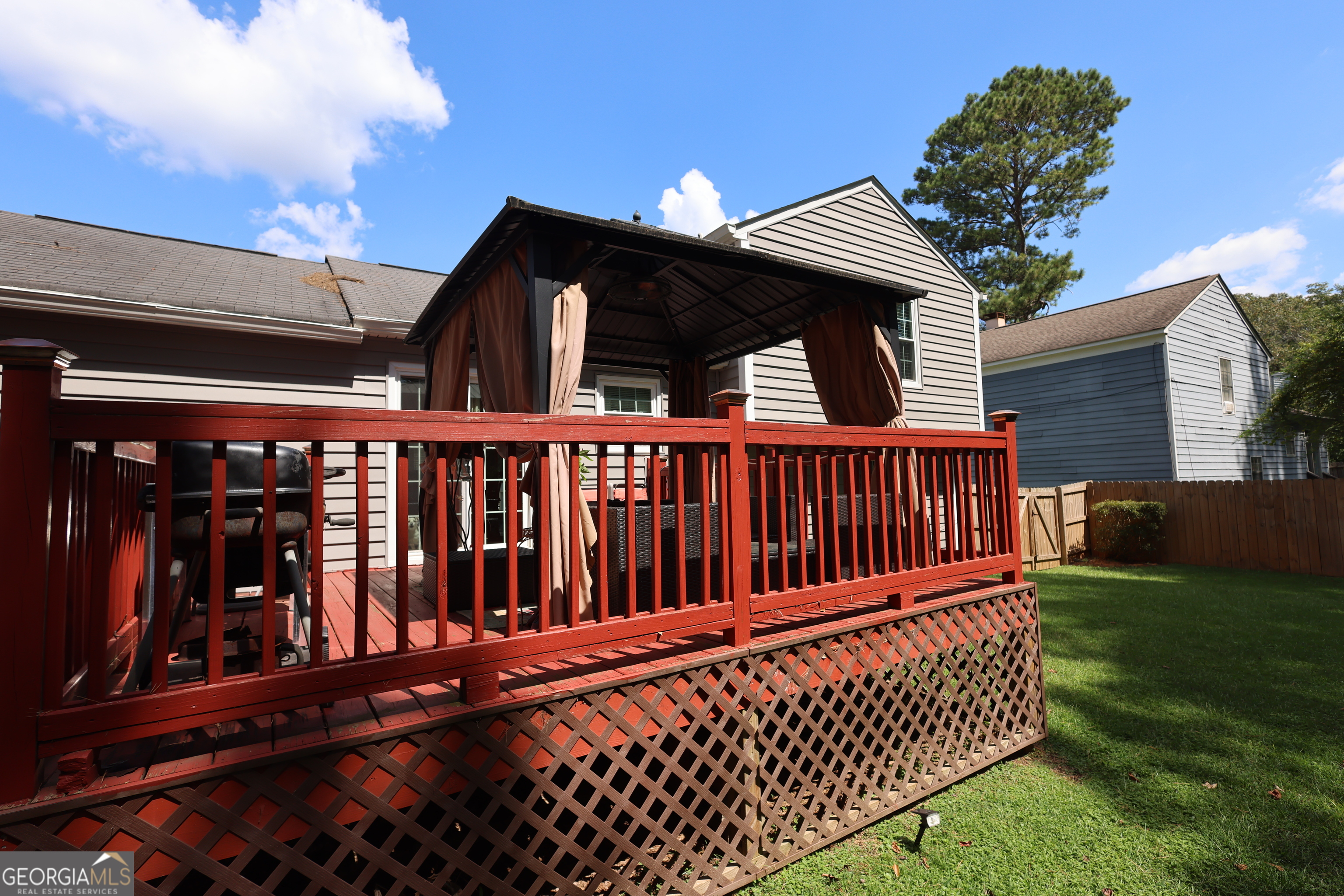 4577 Arborwalk Court Stone Mountain, GA 30083 - Photo 18 of 19 a view of wooden deck