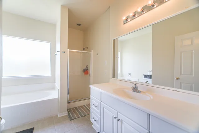 a bathroom with a sink a toilet and a bathtub