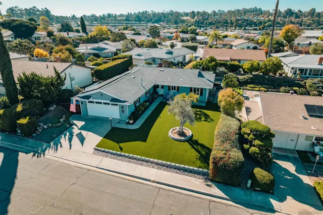 a sign that is on a sidewalk