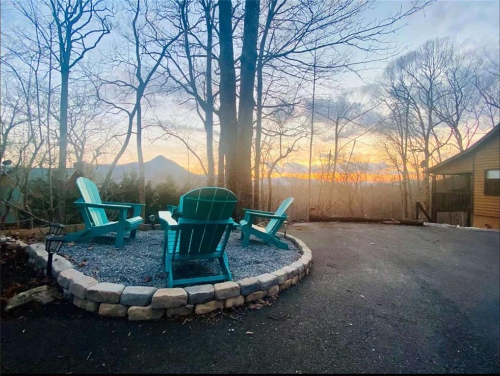 2531 Hunter Road Hiawassee, GA 30546 - Photo 16 of 30 a view of backyard with outdoor seating
