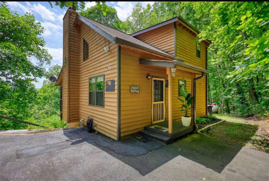 2531 Hunter Road Hiawassee, GA 30546 - Photo 30 of 30 a view of a house with a yard