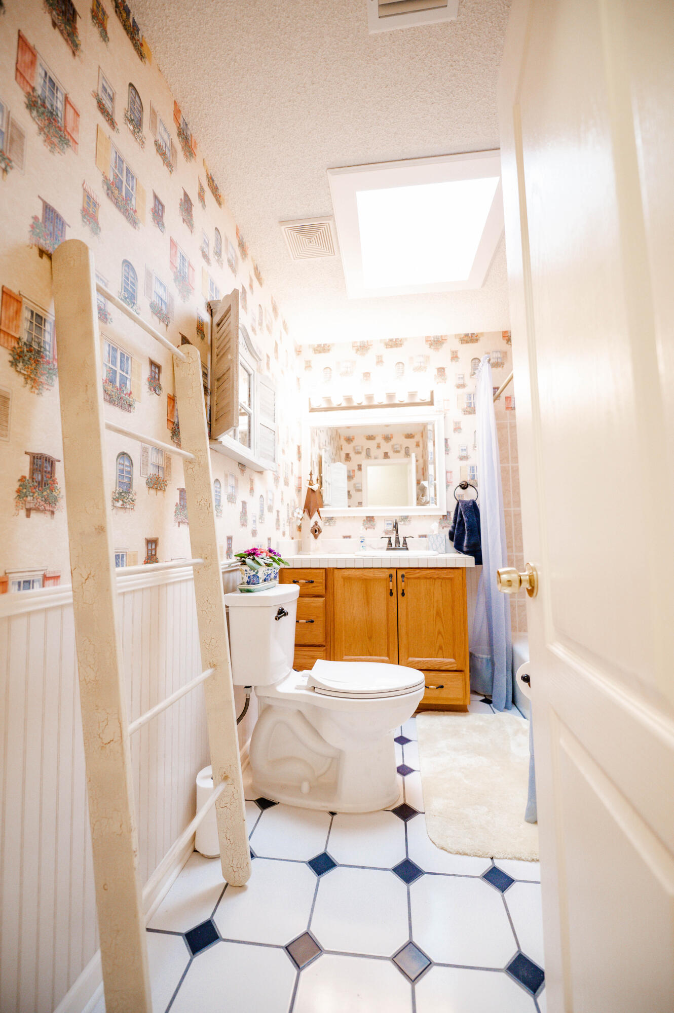 218 Howard Street Niceville, FL 32578 - Photo 15 of 36 a bathroom with a sink toilet and shower