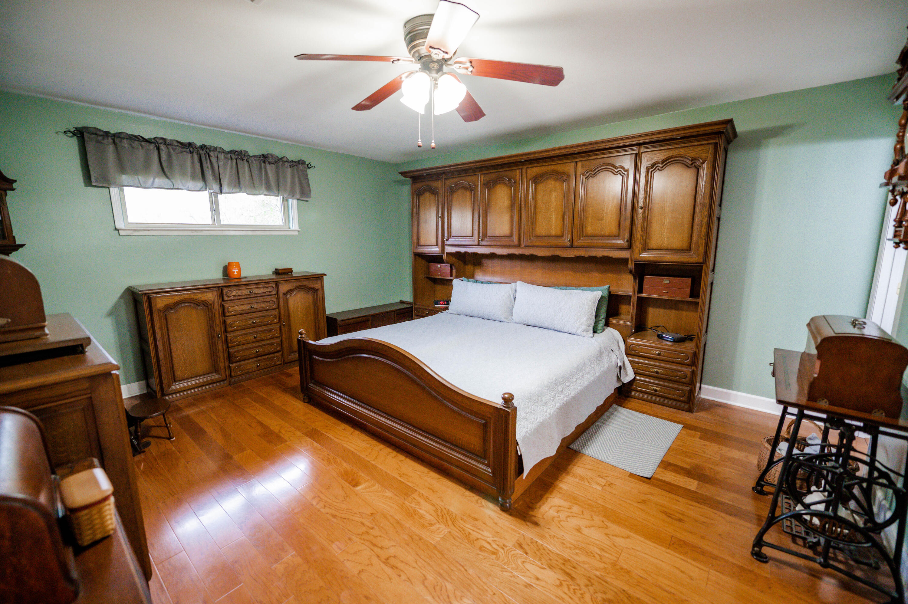 218 Howard Street Niceville, FL 32578 - Photo 22 of 36 a bedroom with a bed window and dresser