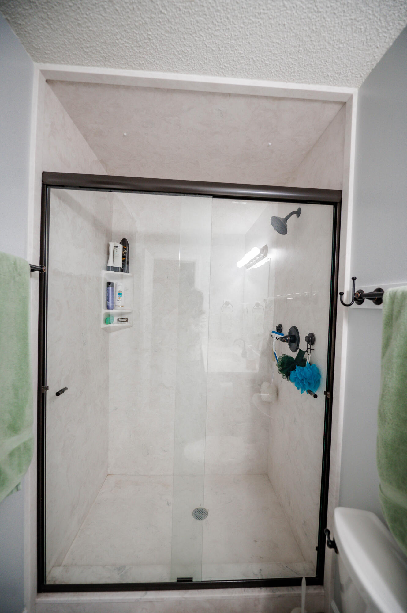 218 Howard Street Niceville, FL 32578 - Photo 24 of 36 a bathroom with a shower