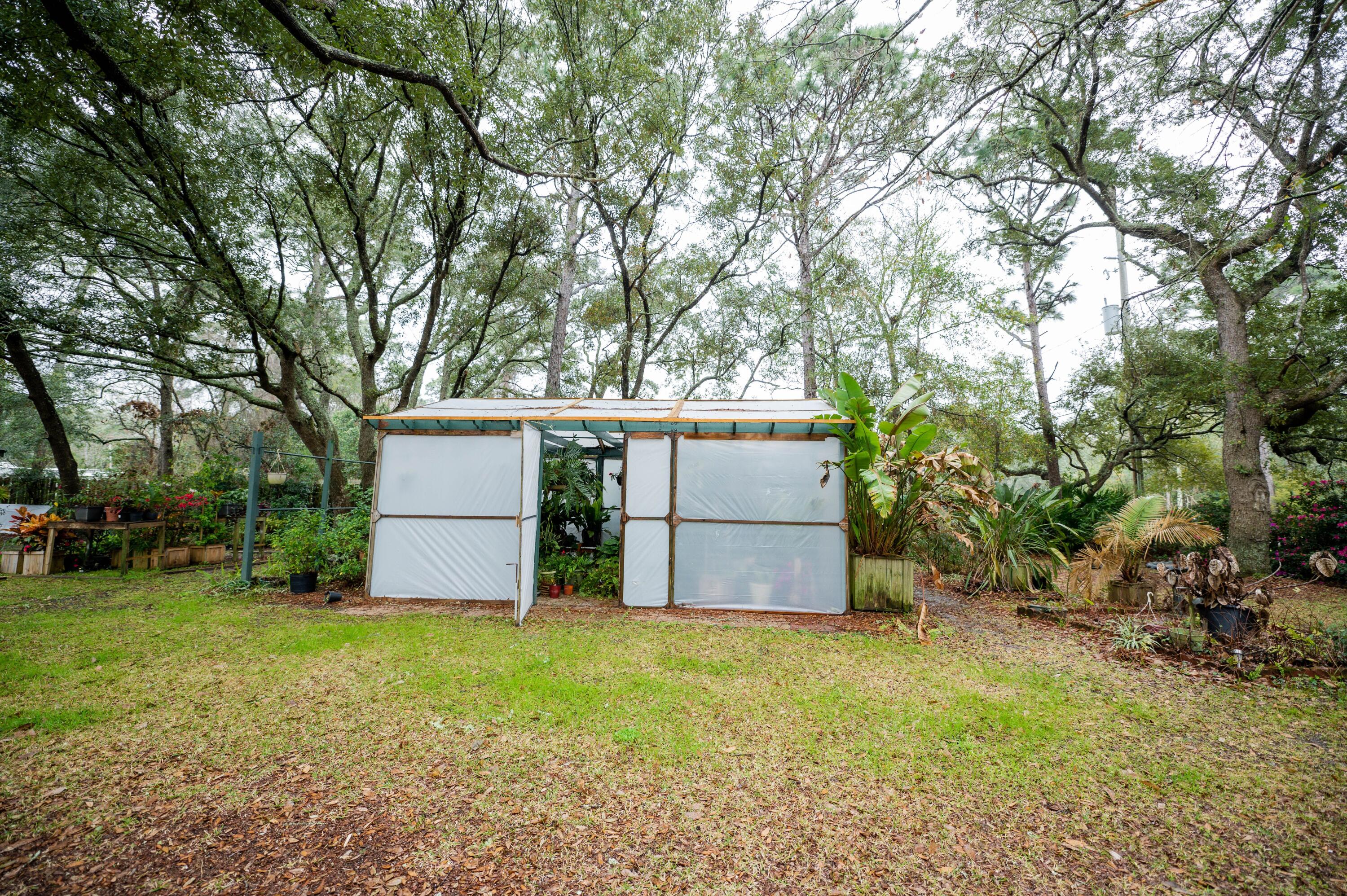 218 Howard Street Niceville, FL 32578 - Photo 32 of 36 a view of a backyard