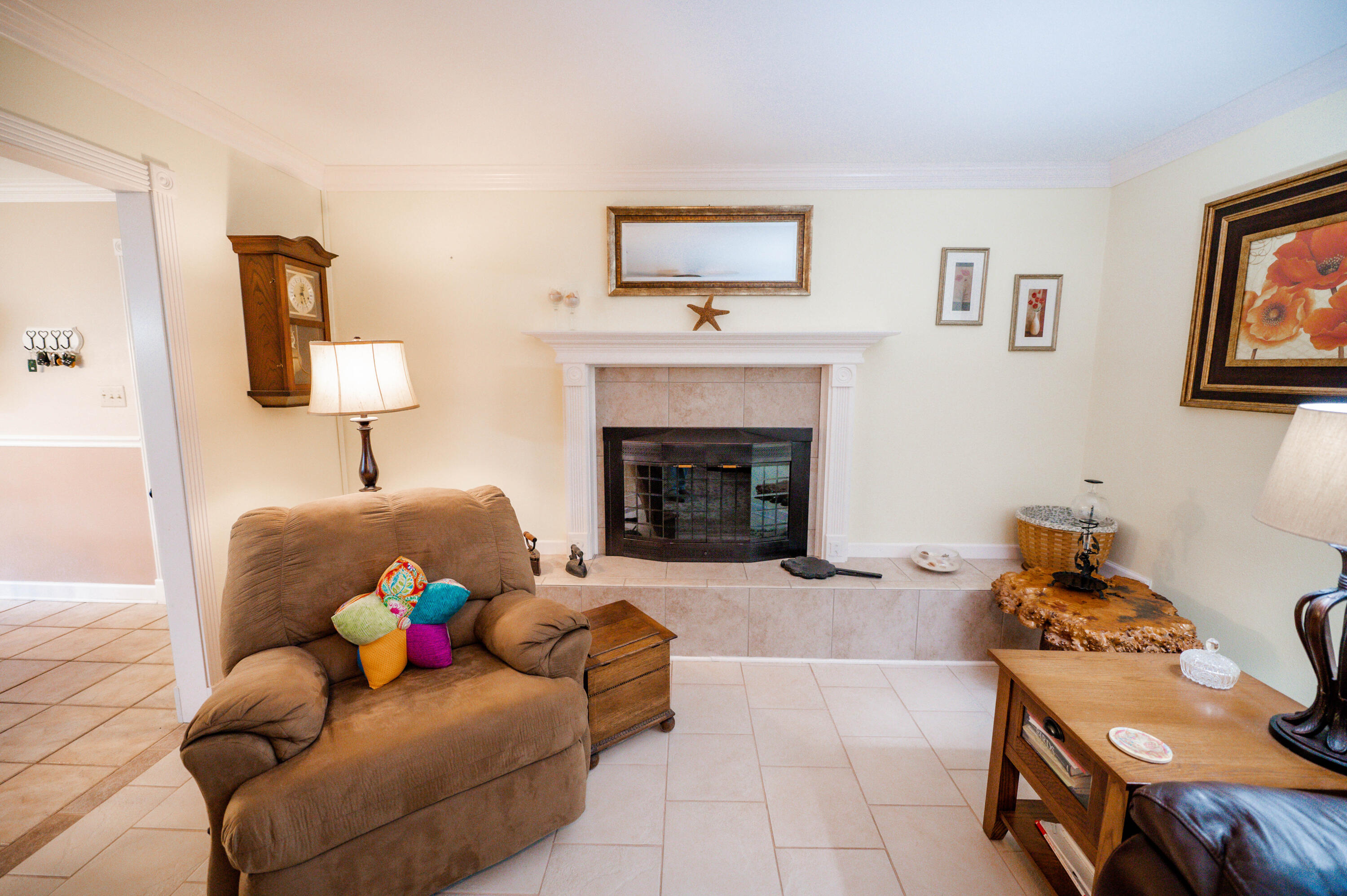 218 Howard Street Niceville, FL 32578 - Photo 8 of 36 a living room with furniture and a fireplace