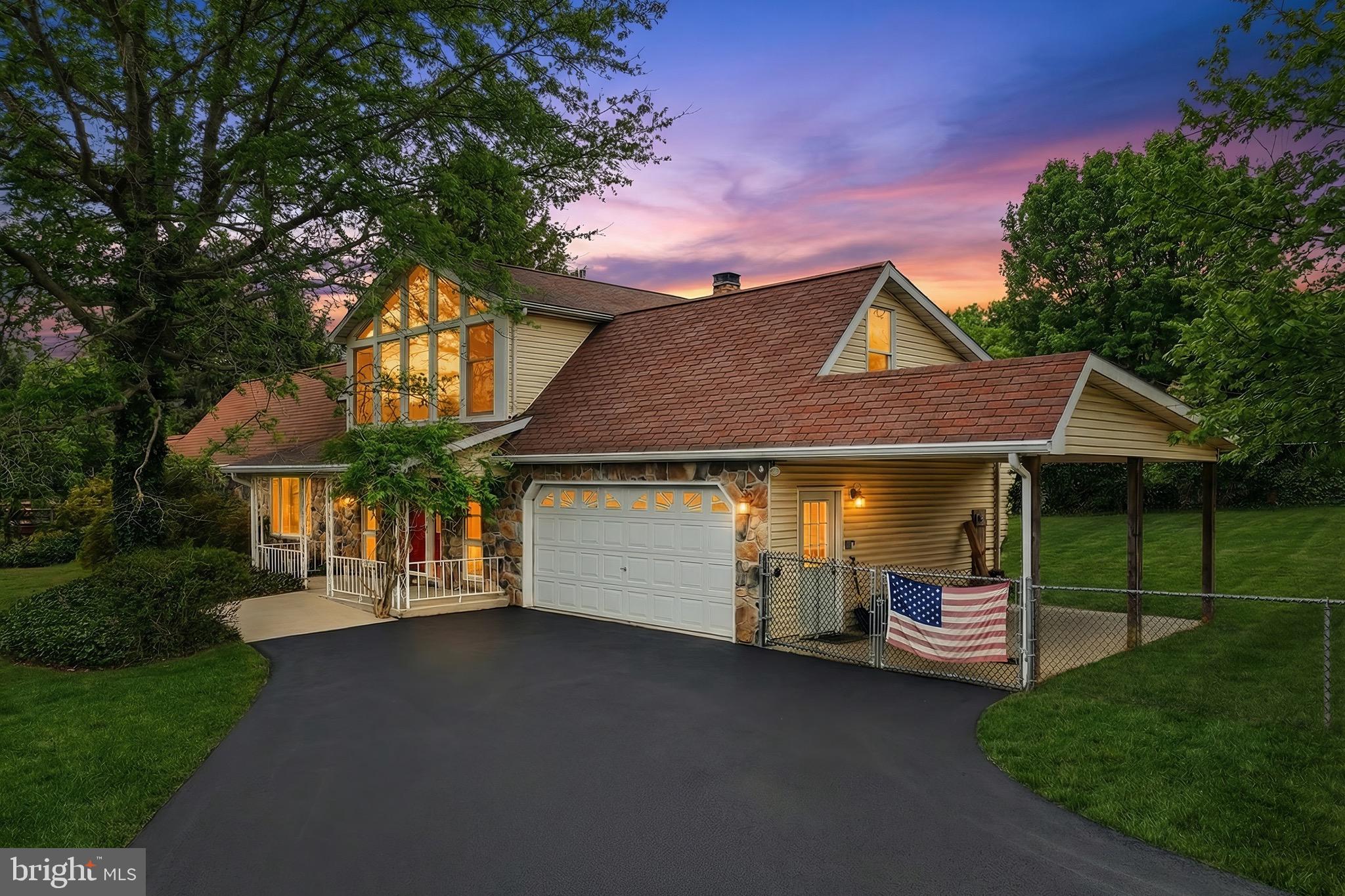 625 Mt Tabor Road Gardners, PA 17324 - Photo 1 of 63 a front view of a house with a garden and tree