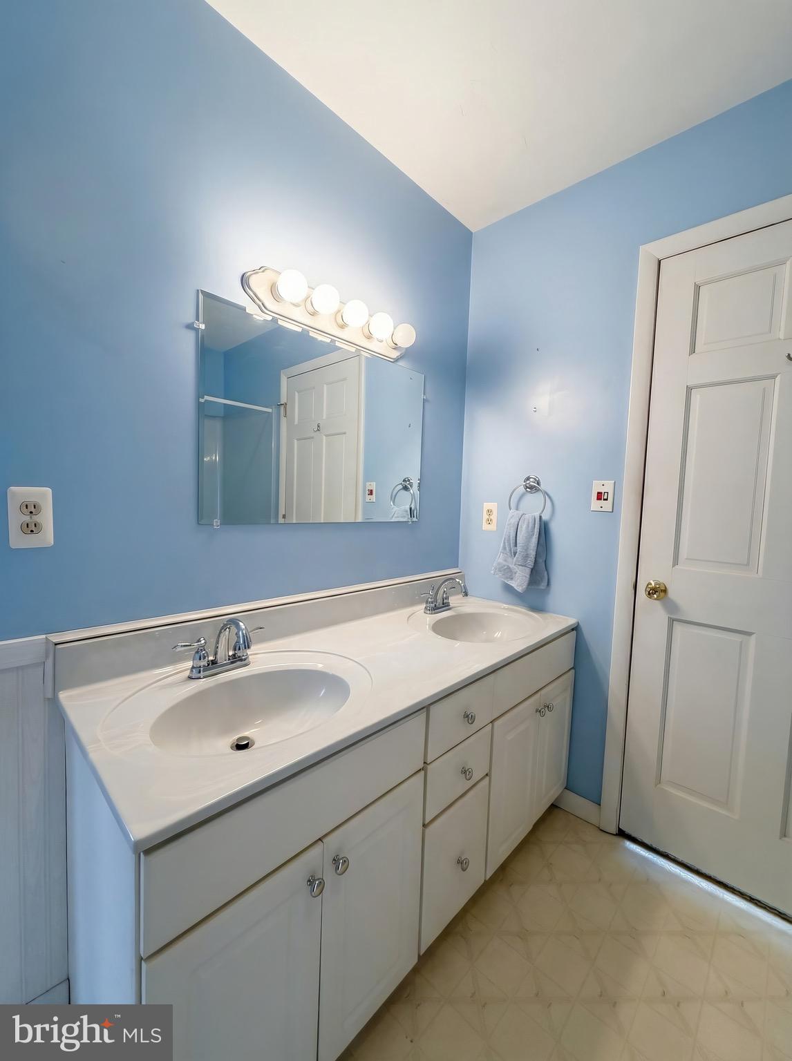 625 Mt Tabor Road Gardners, PA 17324 - Photo 24 of 63 a bathroom with a double vanity sink and mirror