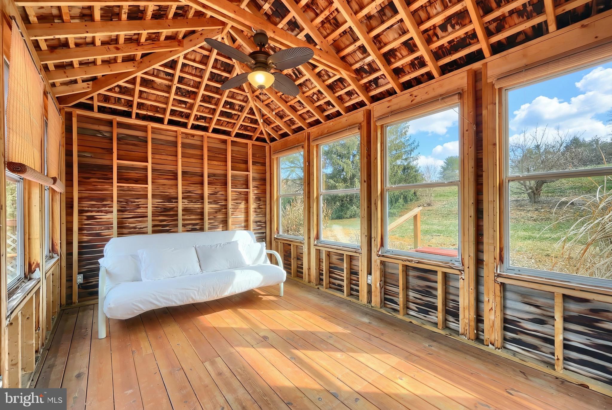 625 Mt Tabor Road Gardners, PA 17324 - Photo 61 of 63 a bedroom with wooden floor and windows