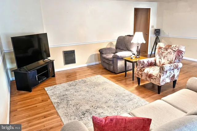 a view of a city from a room with a large window