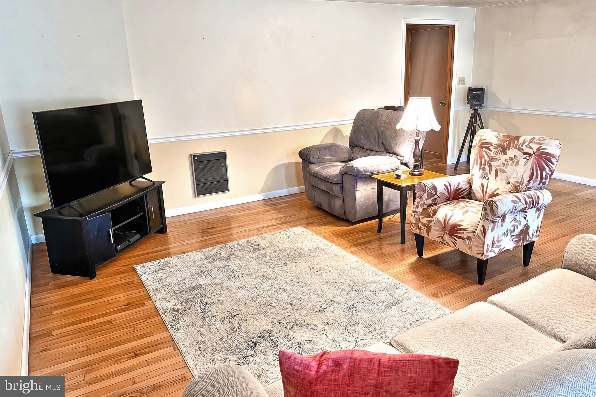 625 Mt Tabor Road Gardners, PA 17324 - Photo 10 of 63 a living room with furniture and a flat screen tv