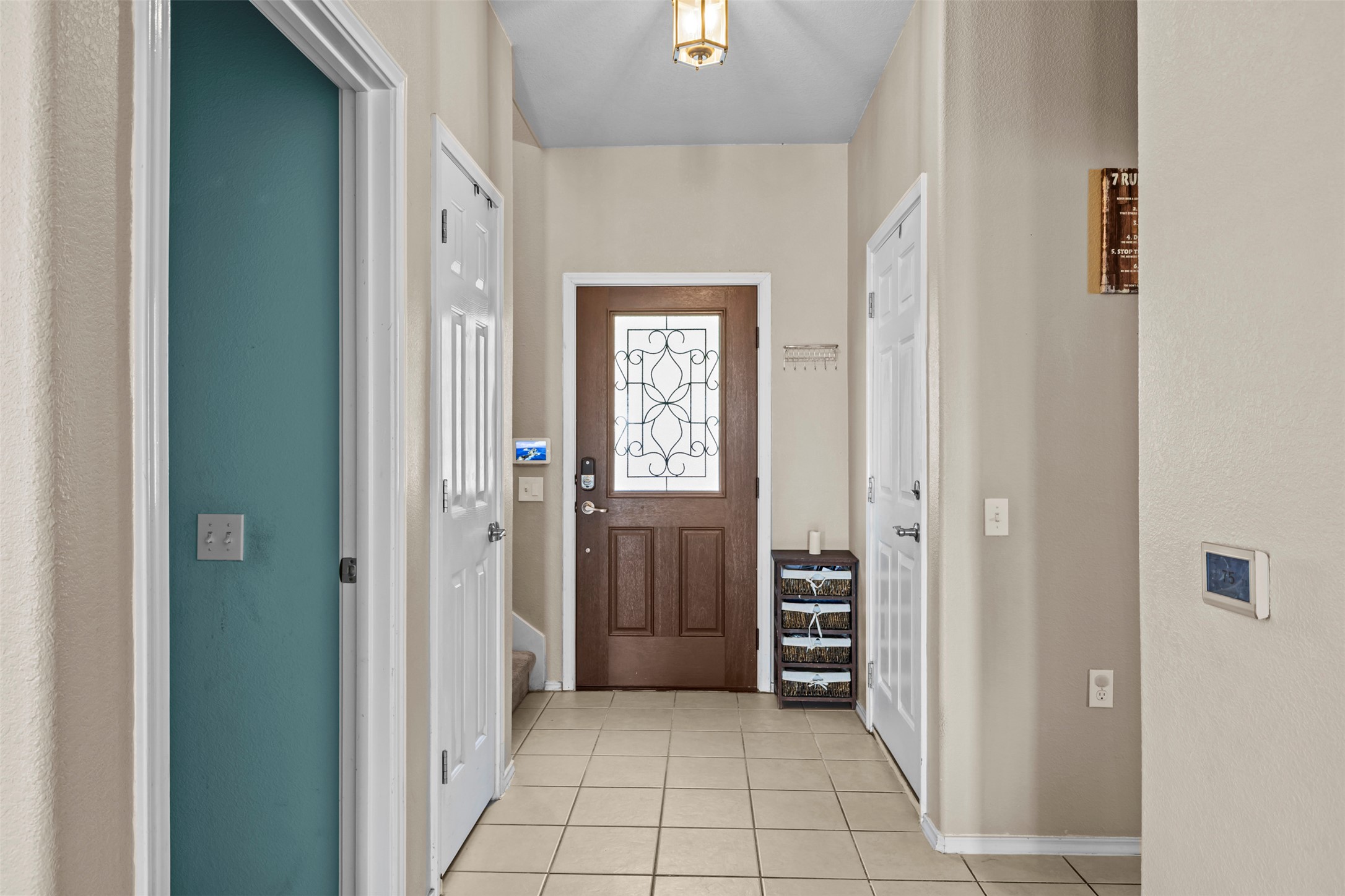5709 Zachary Scott Street Austin, TX 78747 - Photo 6 of 29 a view of a hallway view with wooden floor and closet