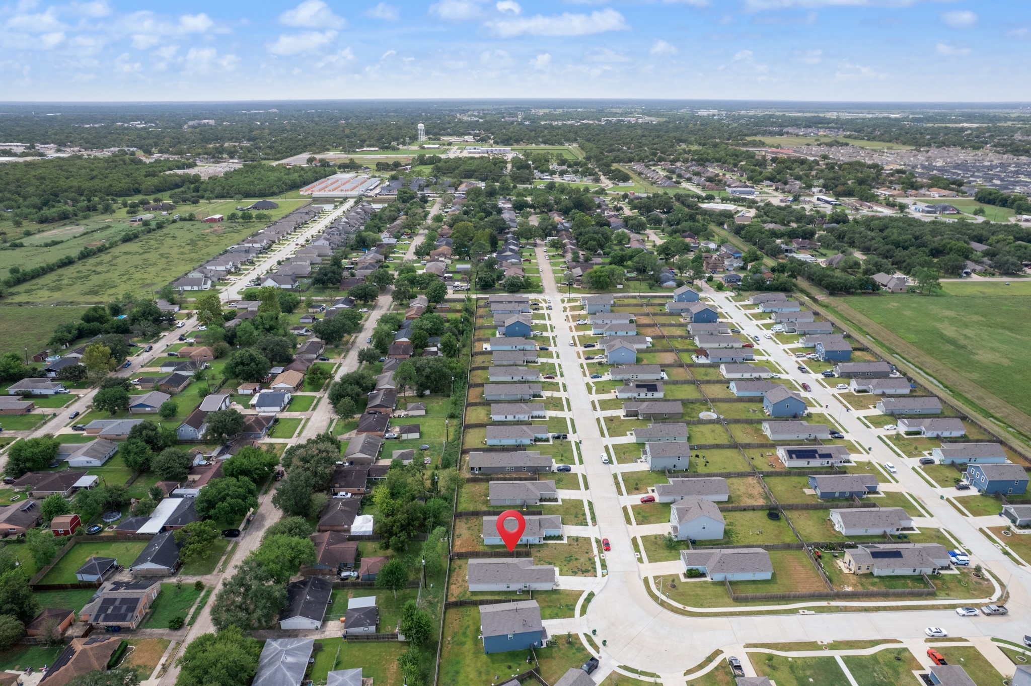 252 Houston Street Angleton, TX 77515 - Photo 48 of 49 Broad neighborhood perspective provides a clear look at the home’s location and the surrounding residential area.