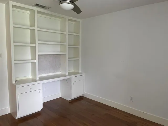 a view of an empty walk in closet