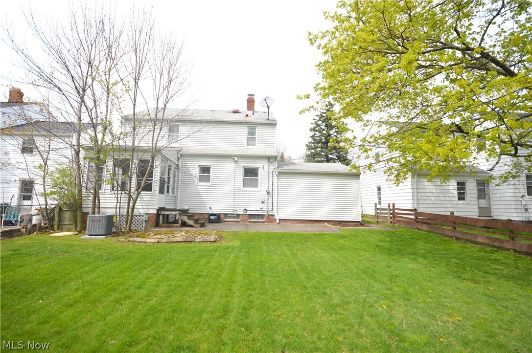 4952 Westbourne Road Cleveland, OH 44124 - Photo 19 of 19 Large backyard with a sunporch and patio.