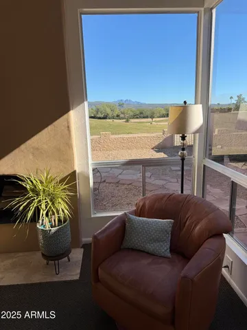 a bedroom with a bed and a view of bathroom
