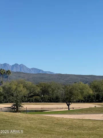 a view of a lake with a mountain