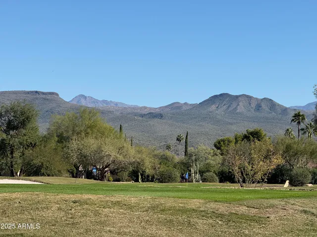 a front view of a building with sitting area