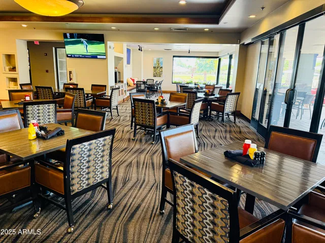 a street sign on a sidewalk next to a road