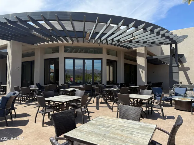 a view of a livingroom with furniture and window