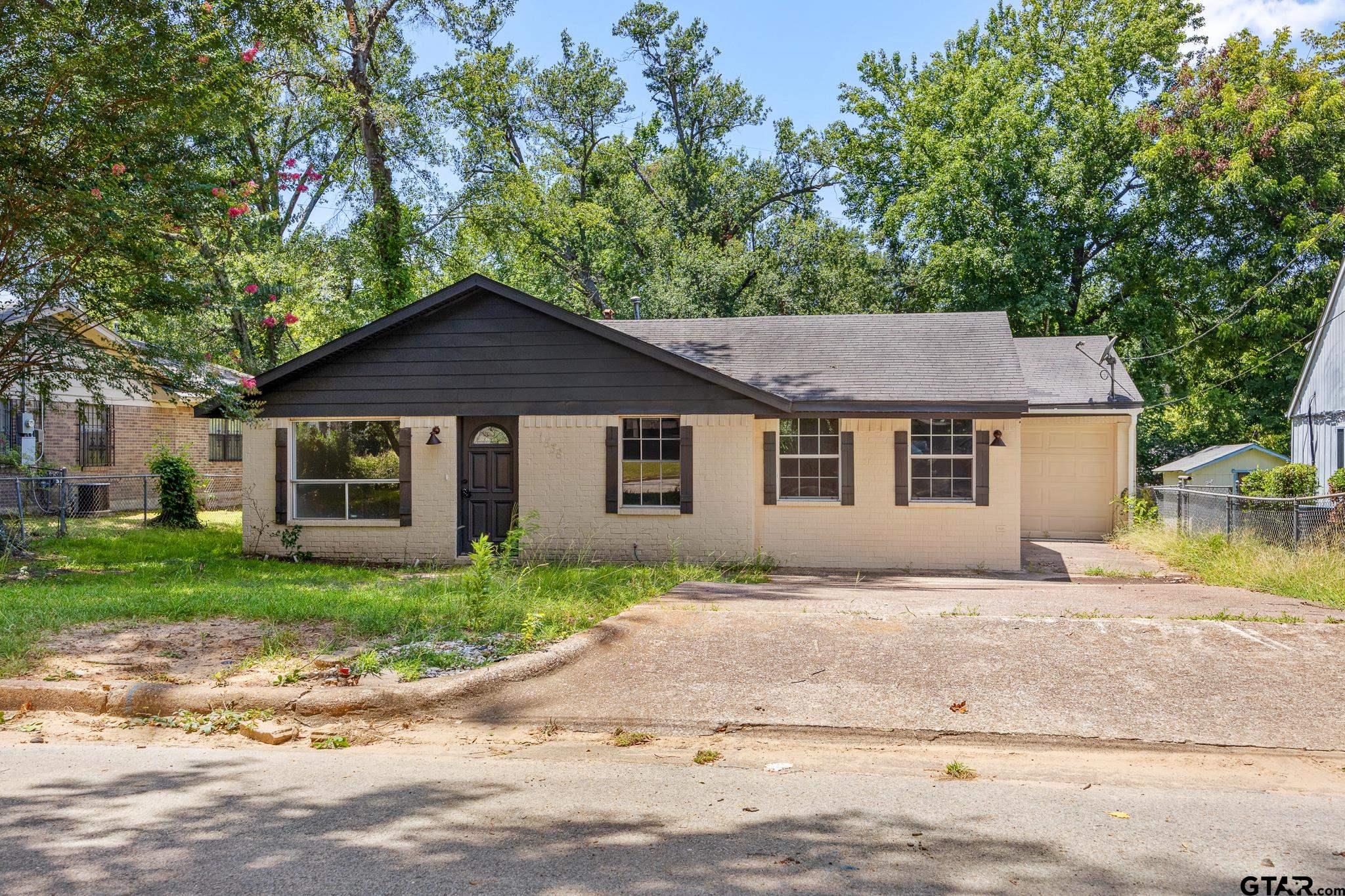1538 North Hill Road Tyler, TX 75702 - Photo 2 of 29 a house with a outdoor space