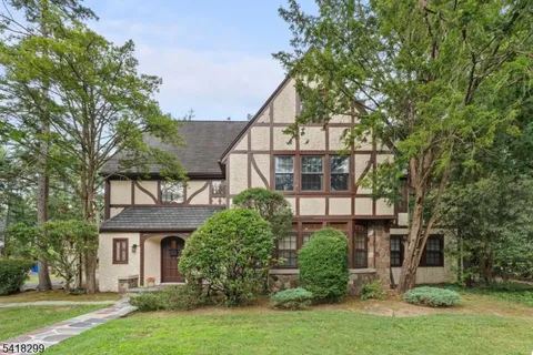 front view of house with a yard