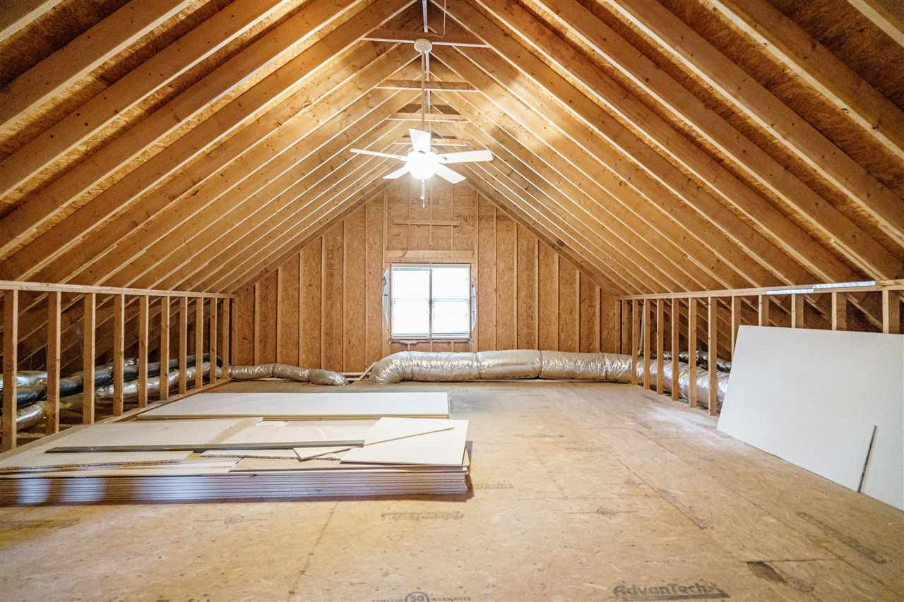 2411 Trenton Woods Way Raleigh, NC 27607 - Photo 25 of 29 Over 1200 square feet up here, if you want to finish. Walk-up Attic