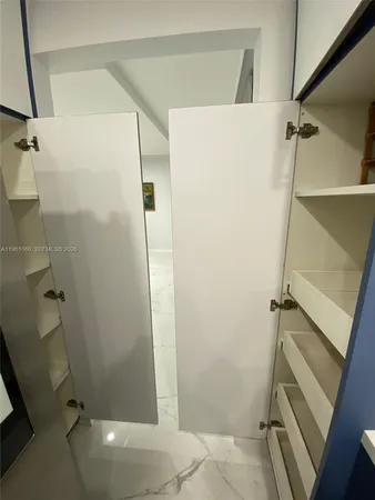 a bathroom with a shower and toilet