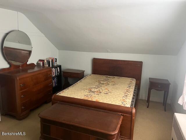 17 High Street Housatonic, MA 01236 - Photo 15 of 17 a bedroom with a bed and wooden floor