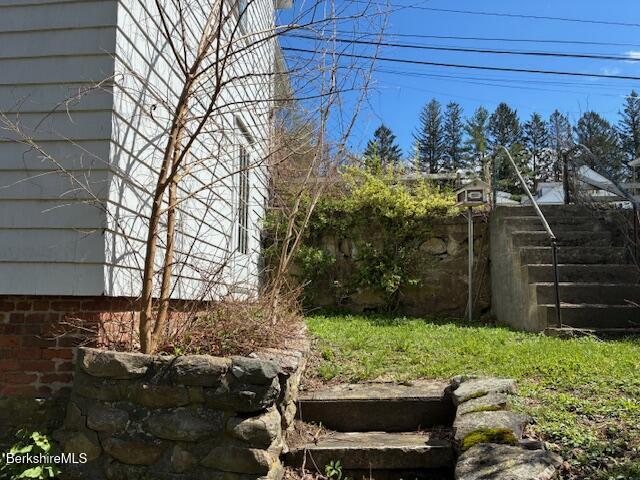 17 High Street Housatonic, MA 01236 - Photo 5 of 17 a backyard of a house with lots of green space and trees