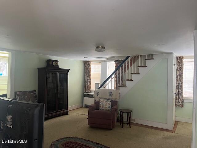 17 High Street Housatonic, MA 01236 - Photo 9 of 17 a living room with furniture and a window