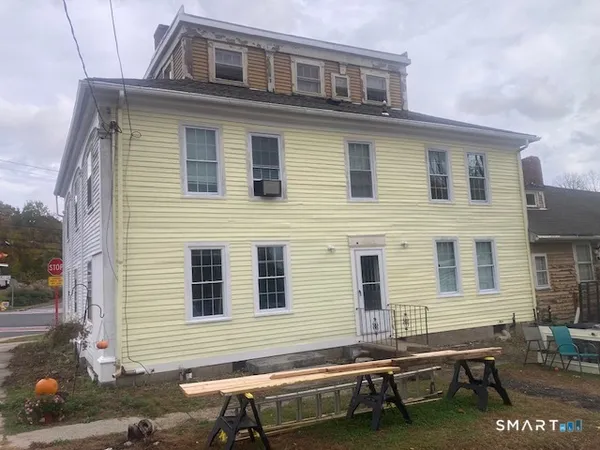 a brick building with a large window