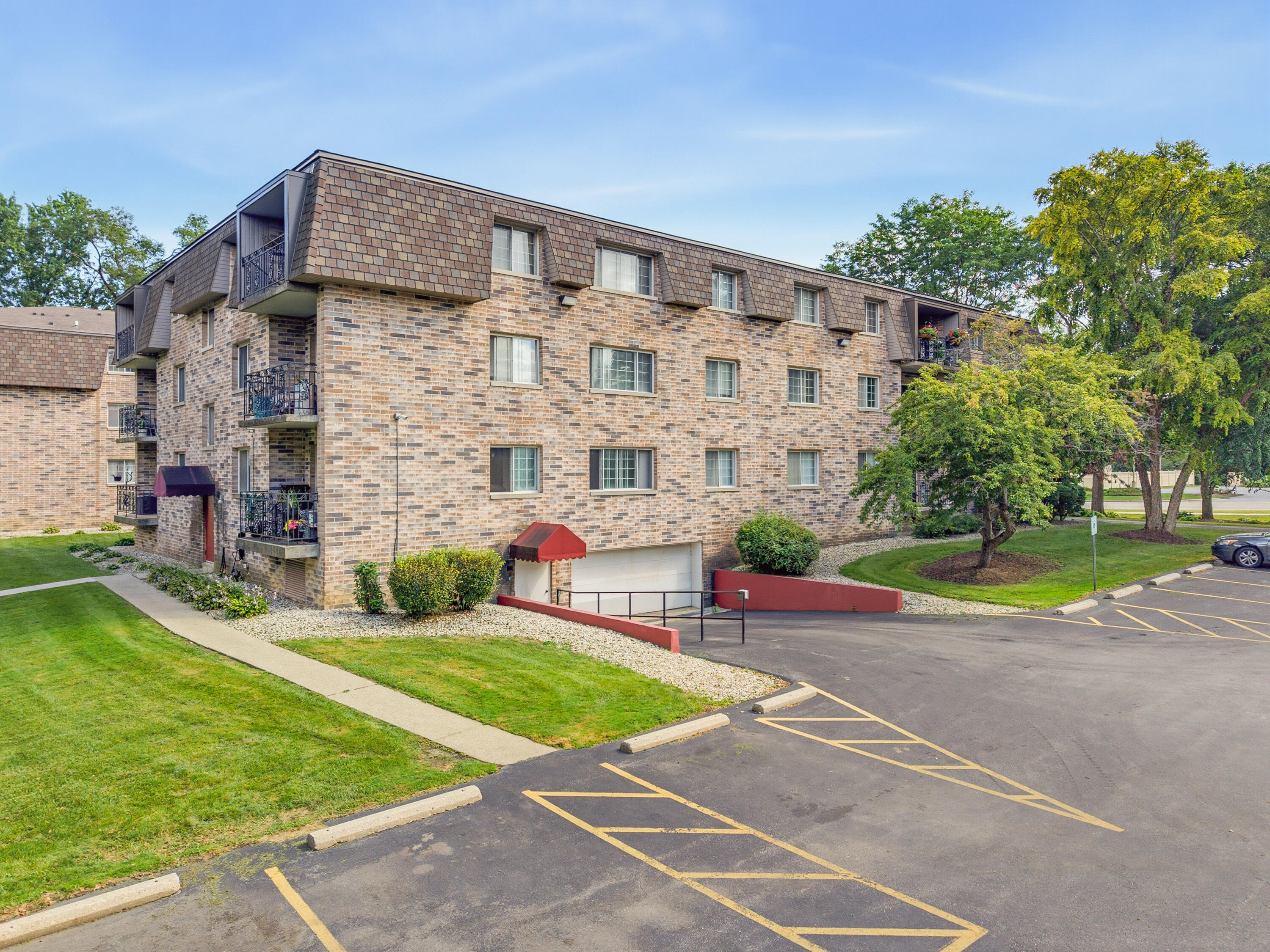 1730 West Green Tree Road, Unit 309 Glendale, WI 53209 - Photo 34 of 42 Surface parking for owners and guests.