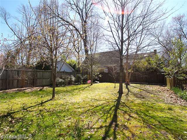 2109 Rolling Road Greensboro, NC 27403 - Photo 16 of 16 Yard/Garden. Fruit trees and green grass are a joy to the eye.