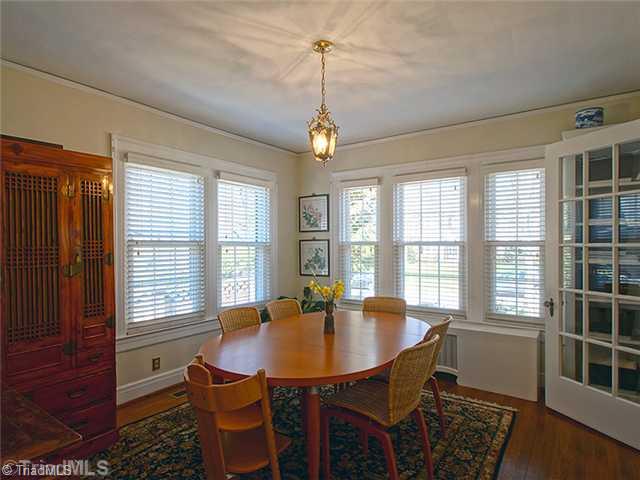 2109 Rolling Road Greensboro, NC 27403 - Photo 6 of 16 Dining Room. Dining room has built in display shelves behind the French doors.