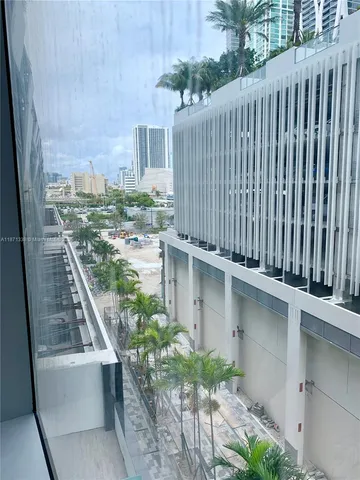 a view of a balcony with plants