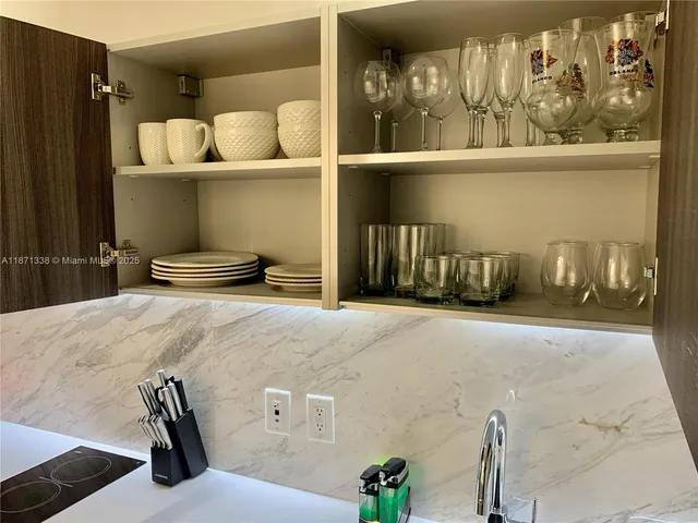 a bedroom with a bed and closet