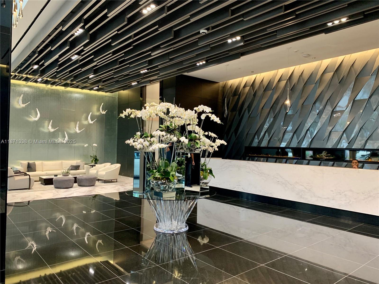 851 Northeast 1st Avenue, Unit 502 Miami, FL 33132 - Photo 21 of 48 a dining room with furniture