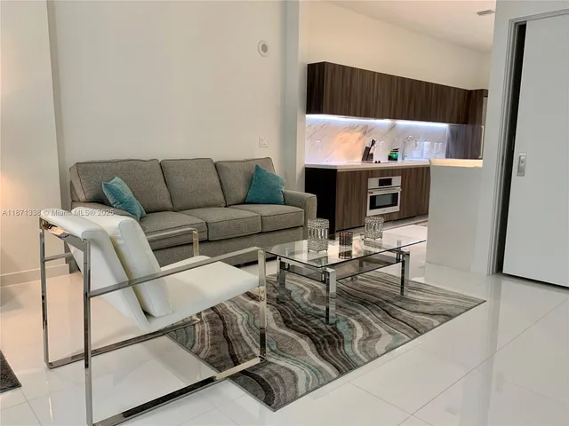 a living room with furniture