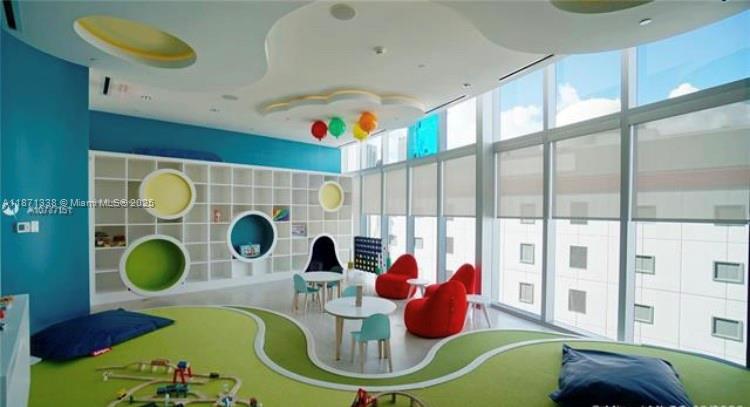 851 Northeast 1st Avenue, Unit 502 Miami, FL 33132 - Photo 33 of 48 a dining room with furniture and a window