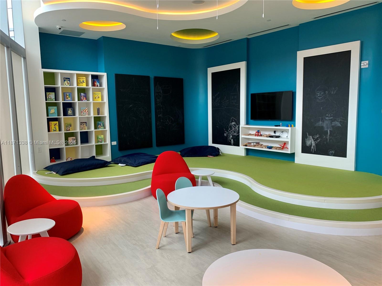 851 Northeast 1st Avenue, Unit 502 Miami, FL 33132 - Photo 34 of 48 a swimming pool with outdoor seating