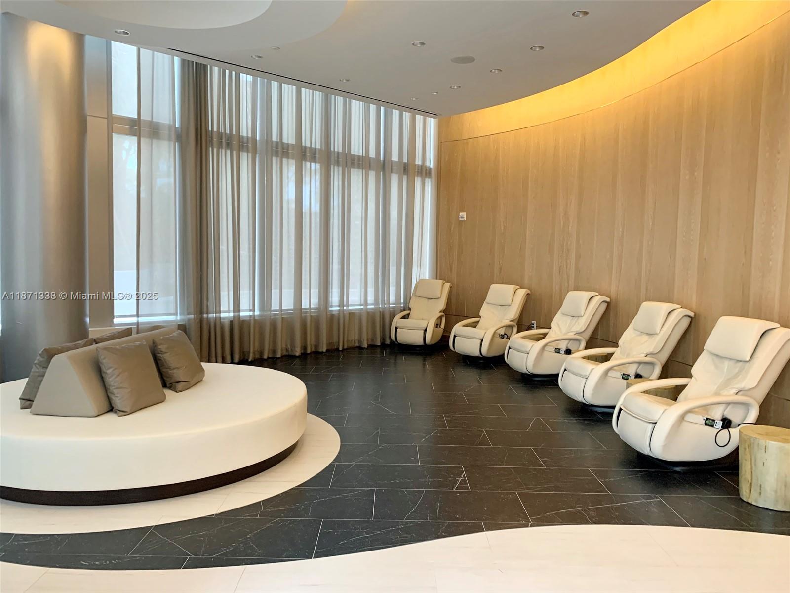 851 Northeast 1st Avenue, Unit 502 Miami, FL 33132 - Photo 42 of 48 a living room with furniture and a large window