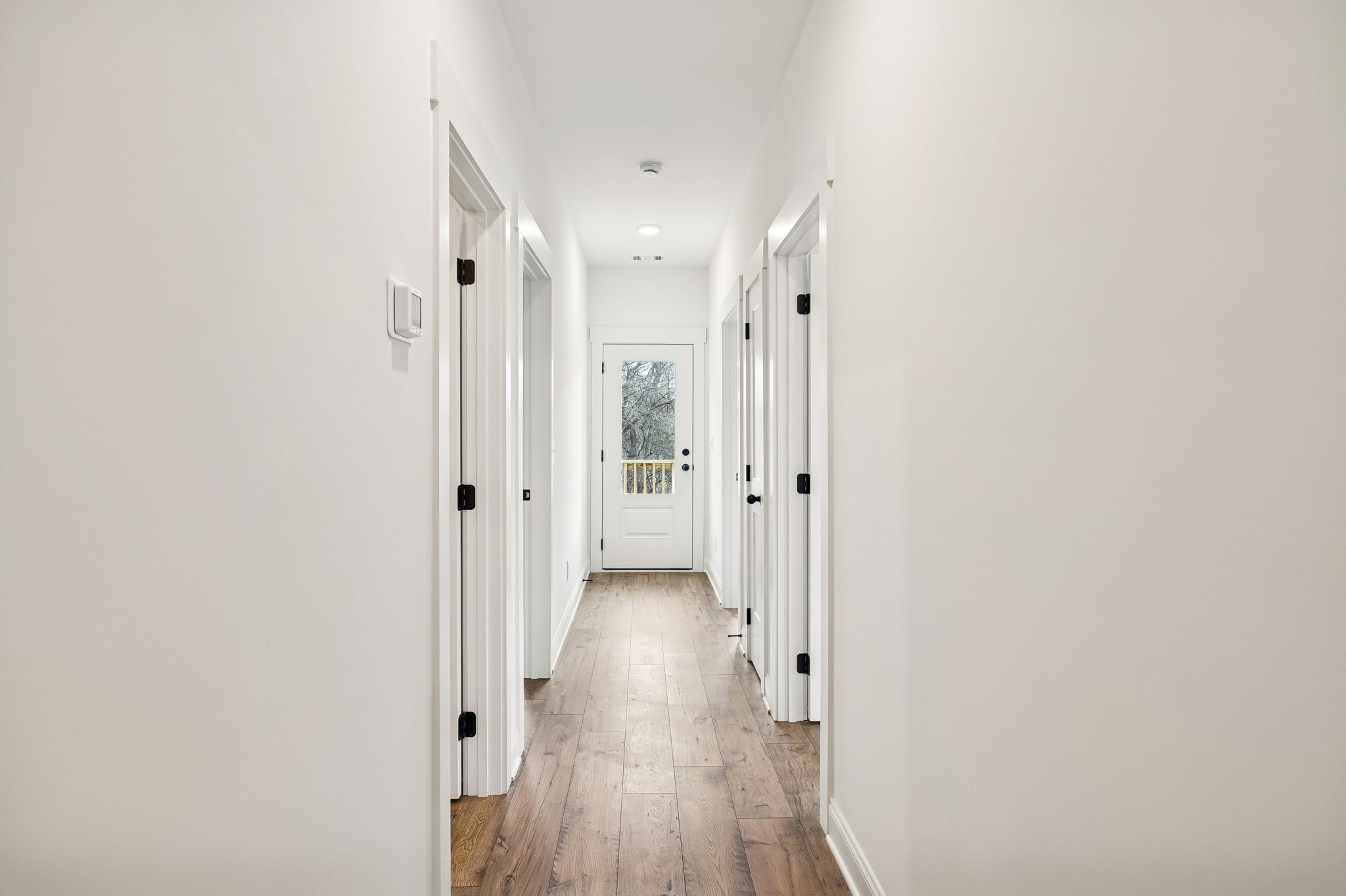 609 South Main Street Mount Pleasant, TN 38474 - Photo 17 of 37 a view of a hallway with wooden floor
