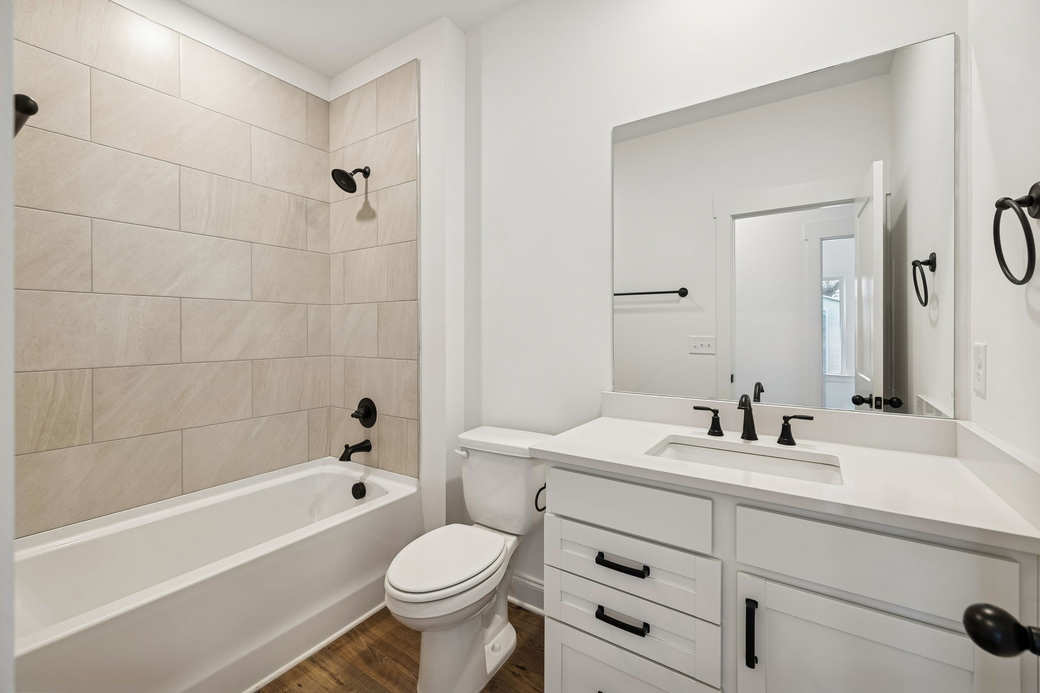 609 South Main Street Mount Pleasant, TN 38474 - Photo 18 of 37 a bathroom with a sink a toilet and shower