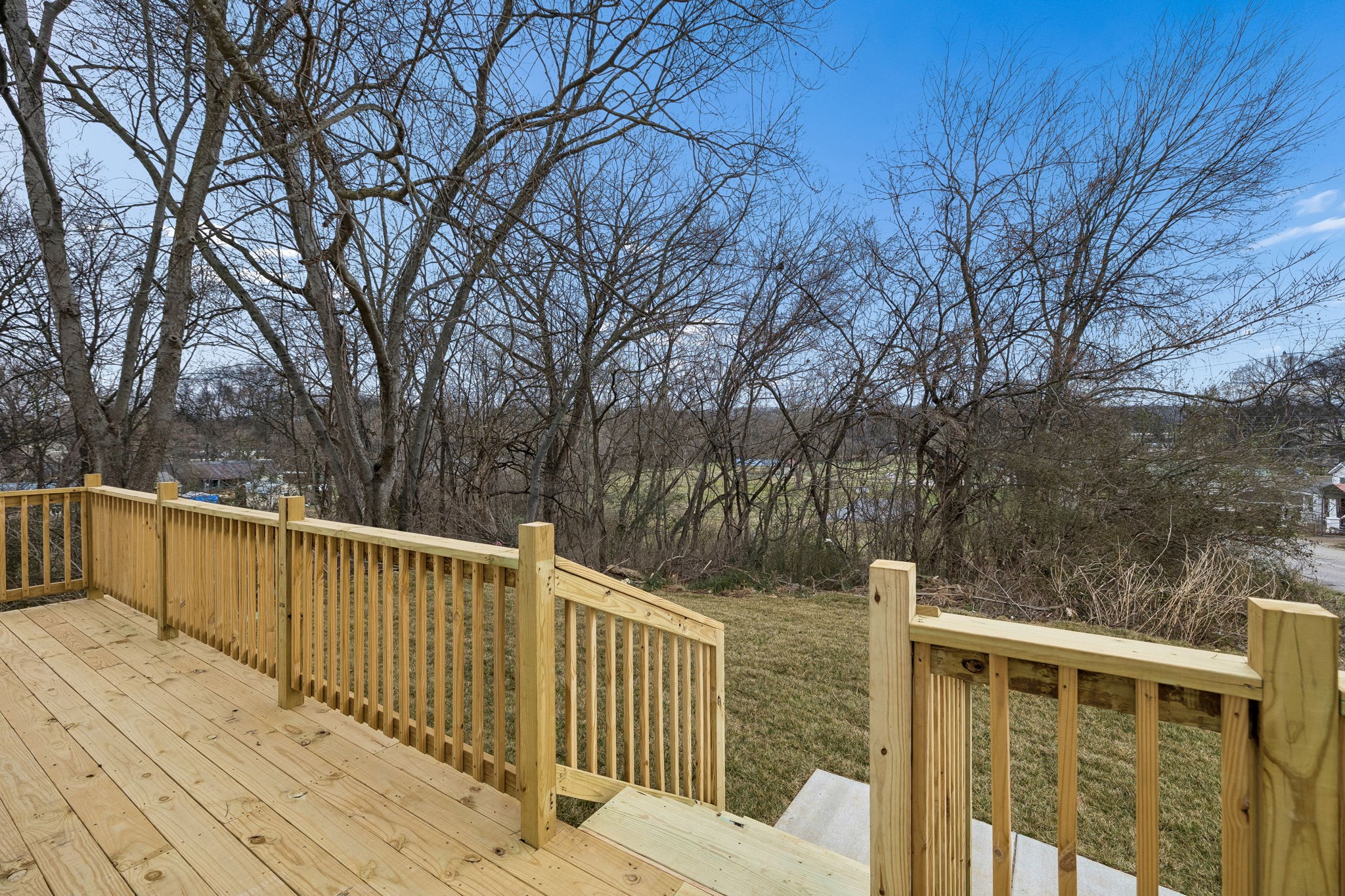 609 South Main Street Mount Pleasant, TN 38474 - Photo 30 of 37 a view of deck with trees in background