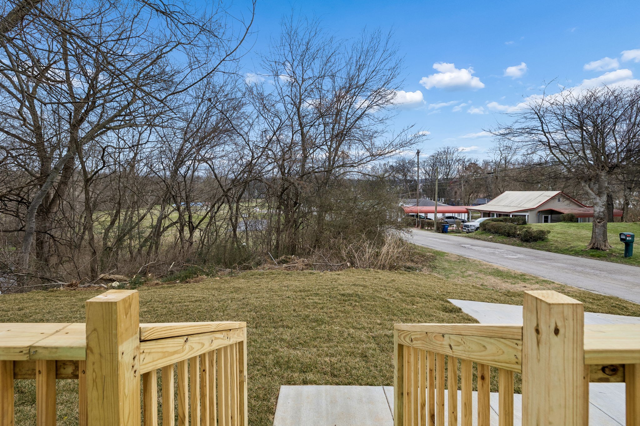 609 South Main Street Mount Pleasant, TN 38474 - Photo 31 of 37 a backyard of a house with lots of green space