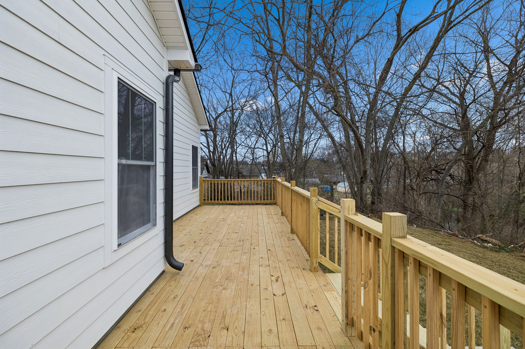 609 South Main Street Mount Pleasant, TN 38474 - Photo 33 of 37 a view of balcony with wooden floor and fence