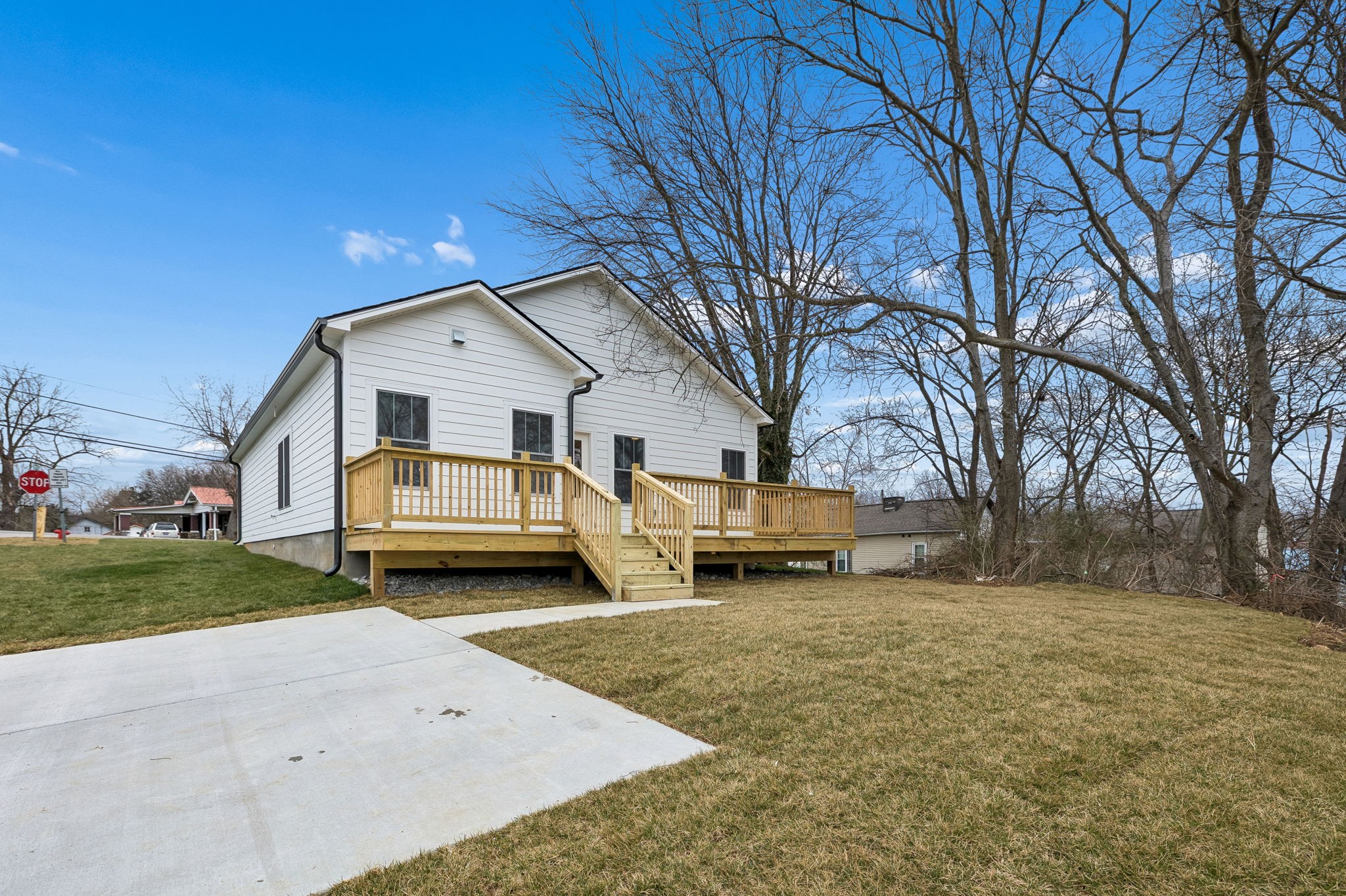 609 South Main Street Mount Pleasant, TN 38474 - Photo 36 of 37 a front view of a house with a yard and garage