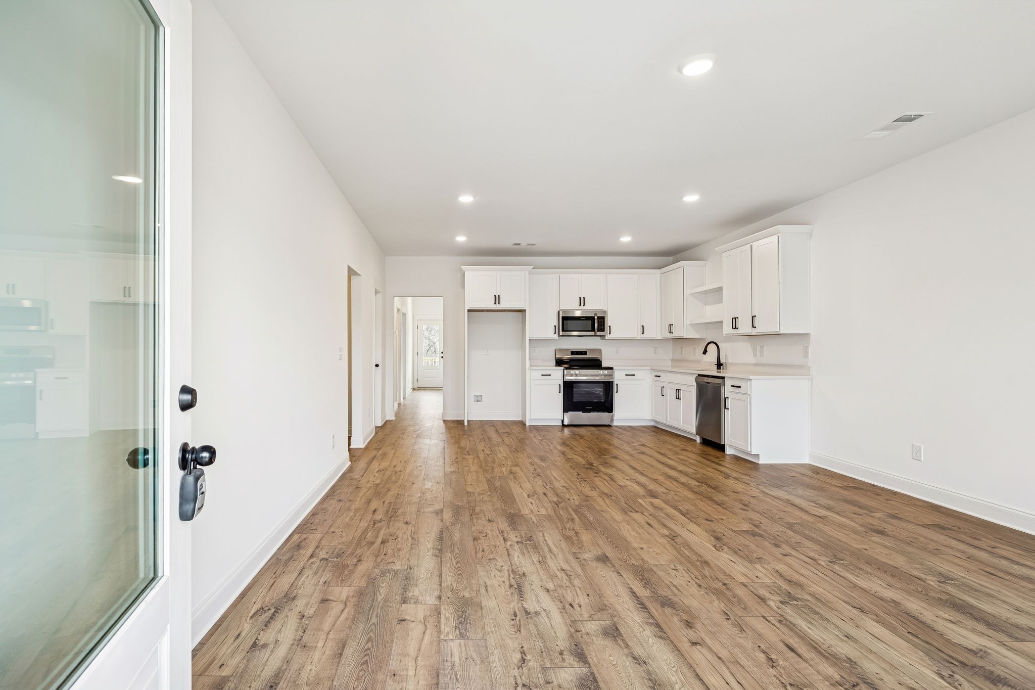609 South Main Street Mount Pleasant, TN 38474 - Photo 7 of 37 a view of kitchen with wooden floor